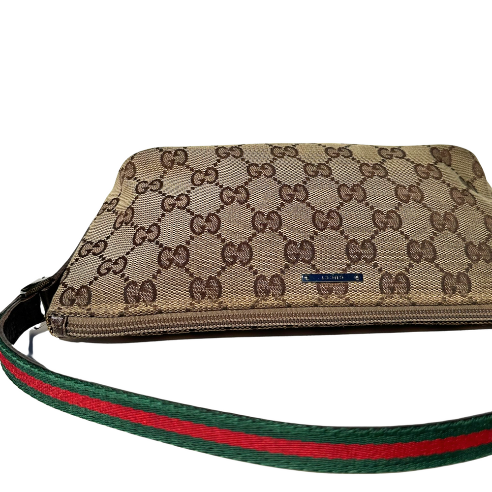 
                  
                    Gucci GG Canvas Boat Bag
                  
                